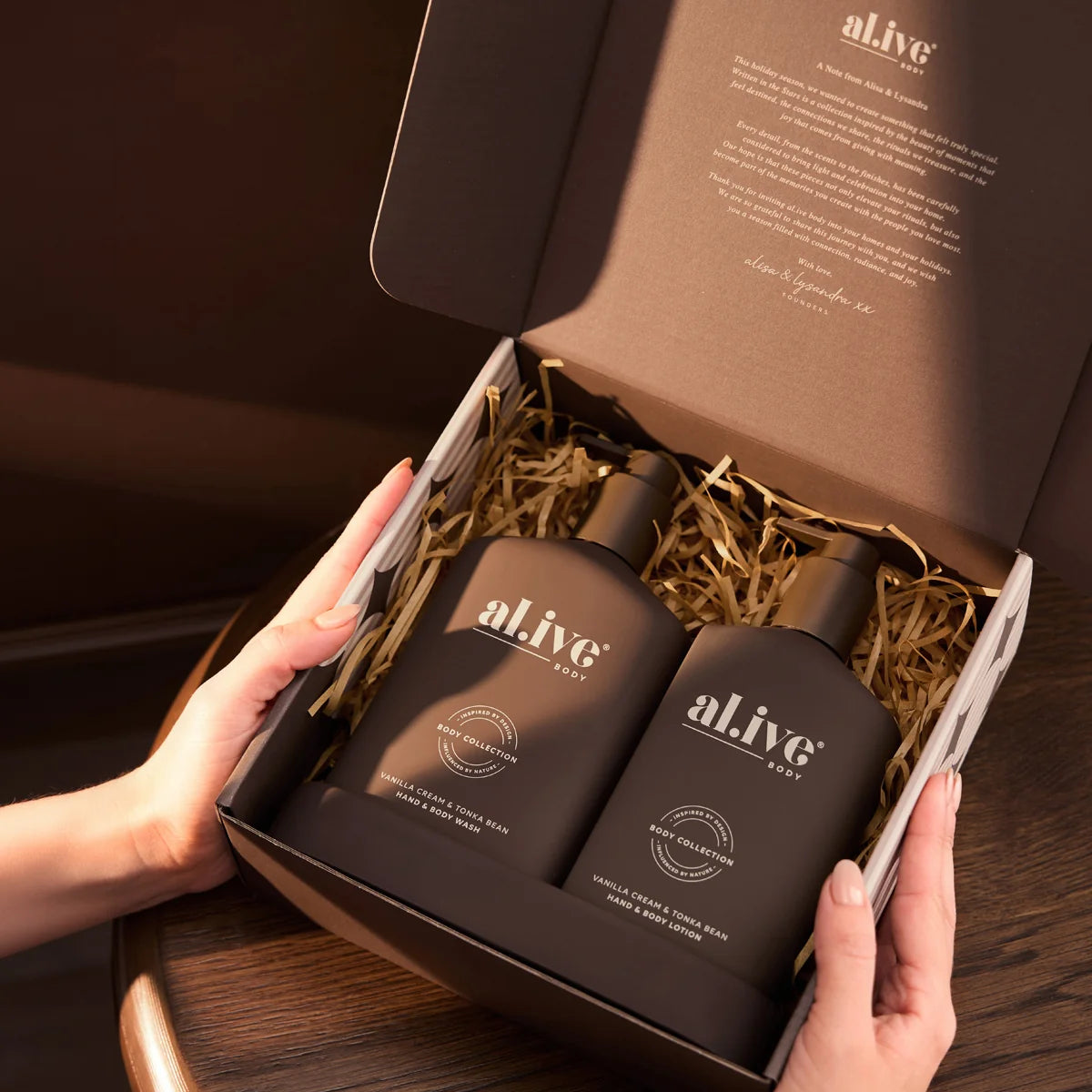 al.ive body Transformative Duo being unboxed from its festive gift box
