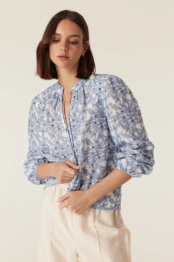Close-up detail of the Cable Melbourne Juliette Blouse in Blue Flower print, worn