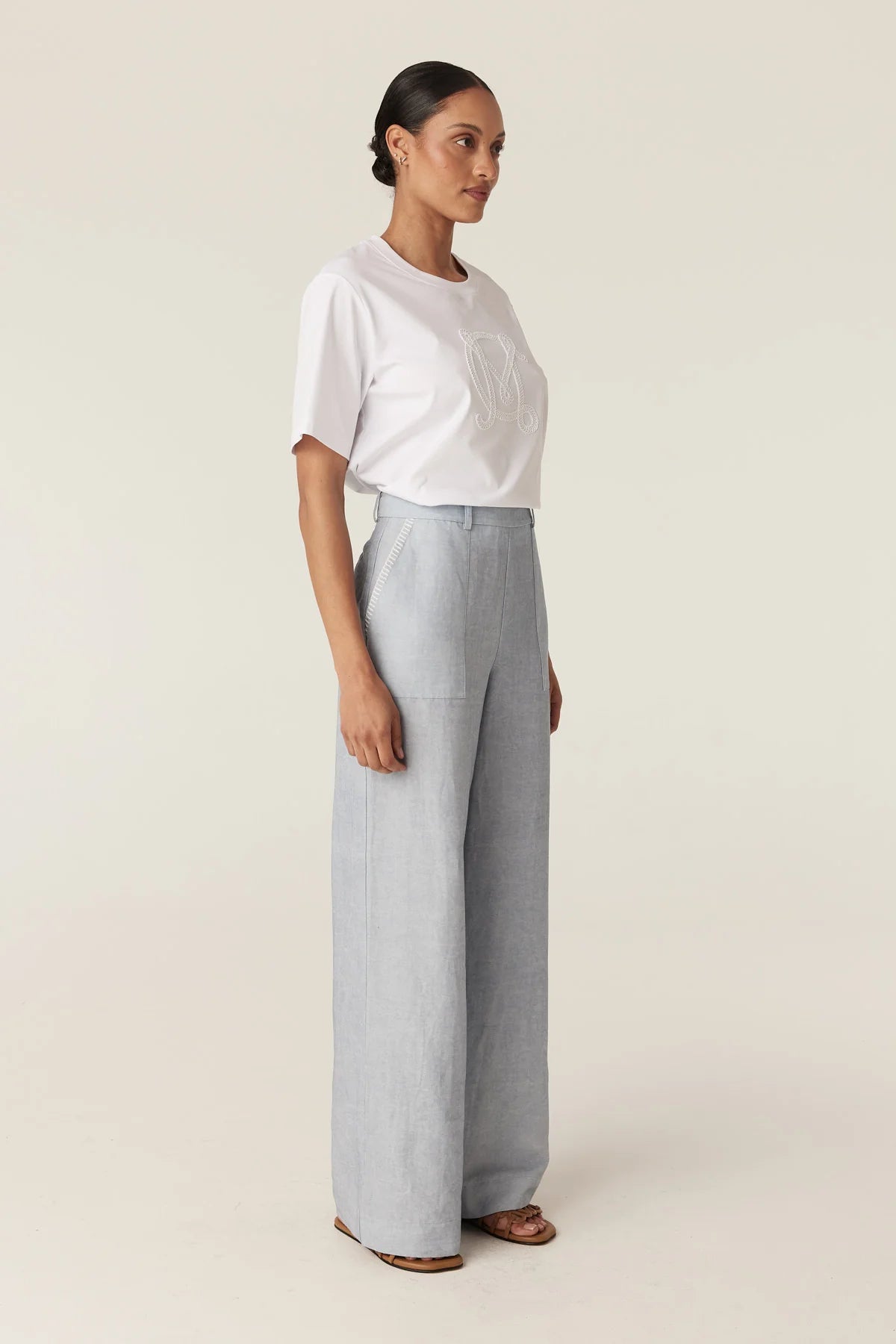 Cable Melbourne Leona Pant in Ice Blue, worn with a white tee - three-quarter view