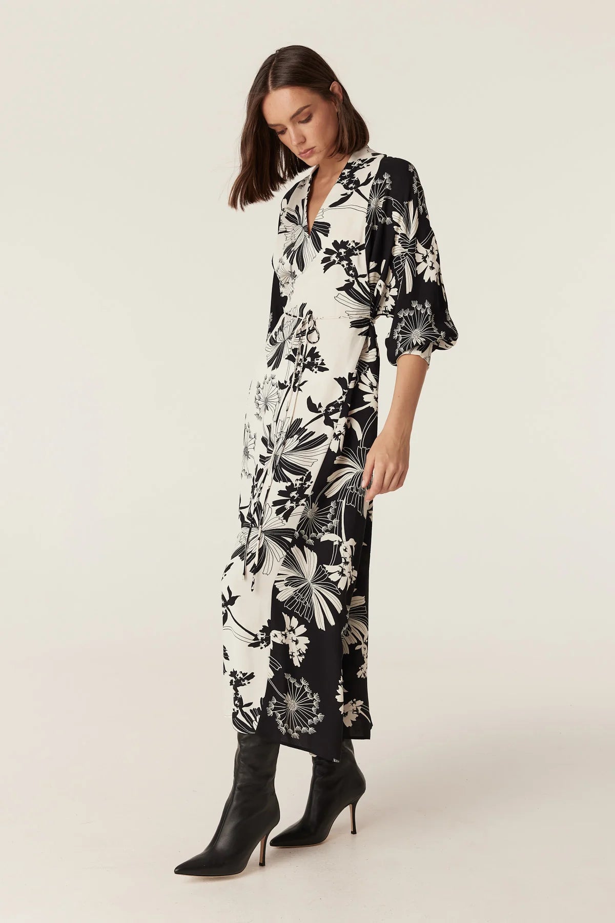 Side view of the Cable Melbourne Rita Midi Dress in Deco Print showing the batwing sleeve