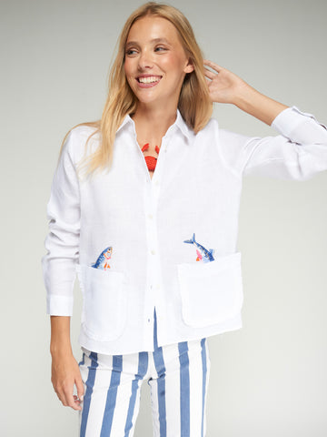 Vilagallo Embroidered Ruffle Pockets Linen Shirt in white worn by model with coral crab necklace