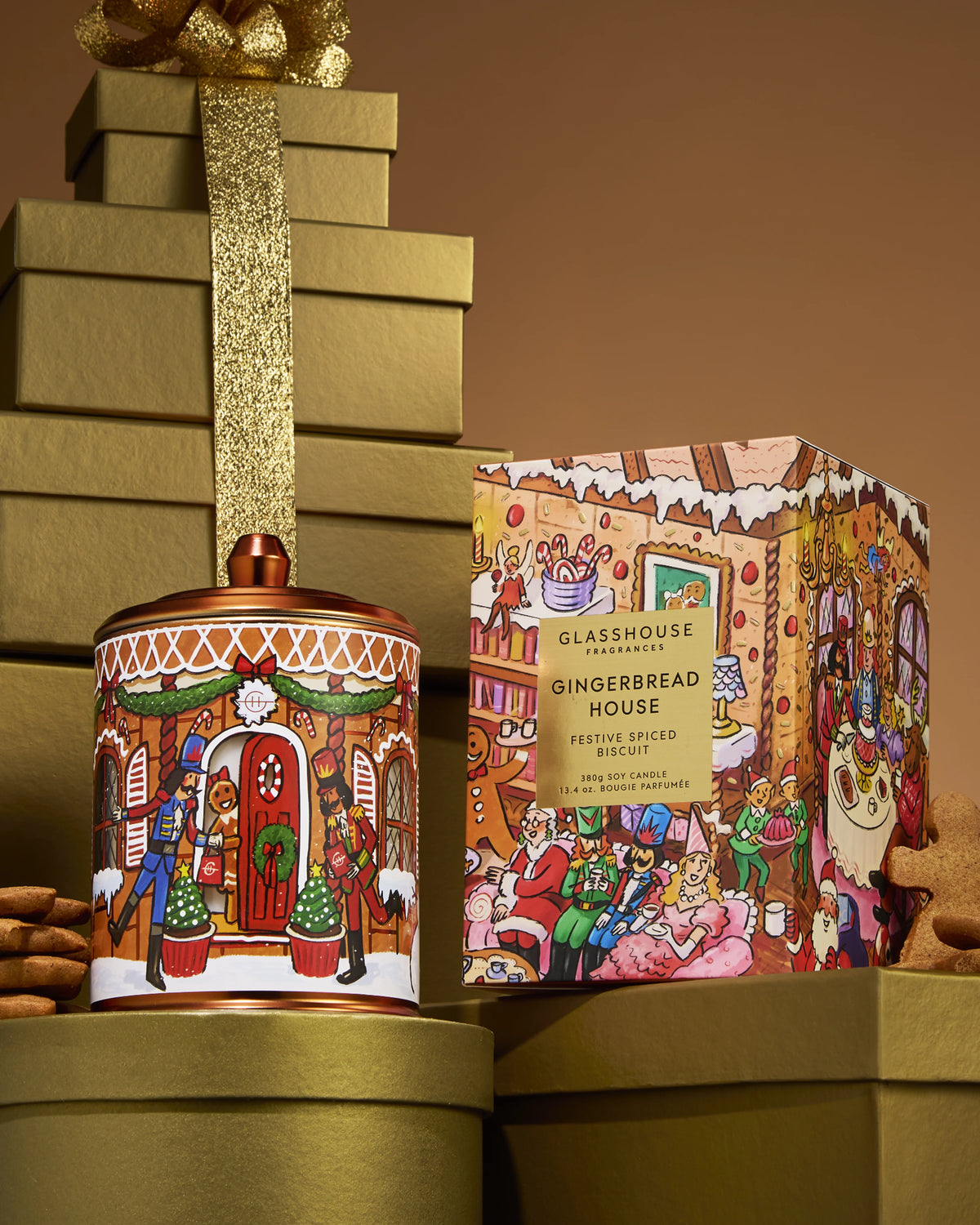 Glasshouse Fragrances Gingerbread House 380g Candle and box styled on gold gift boxes
