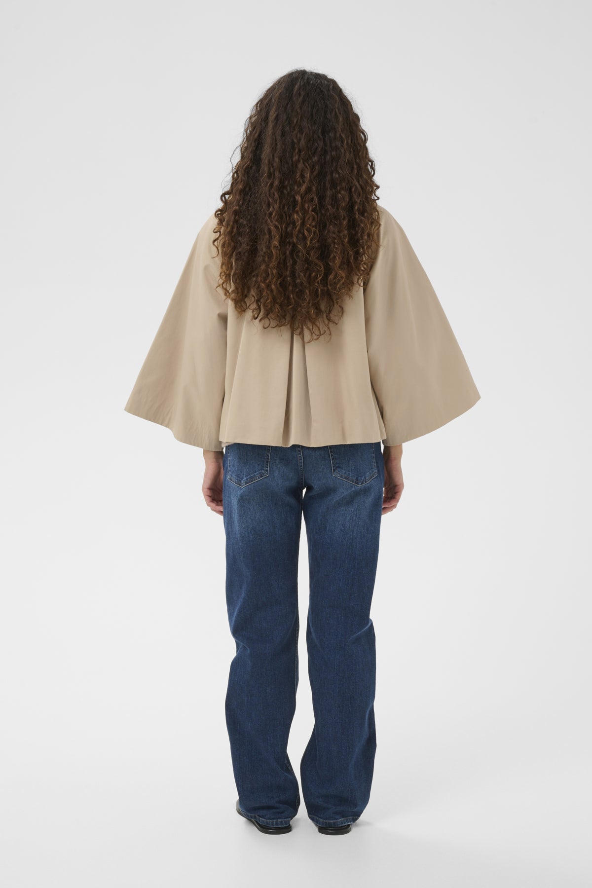 Haus of Alma InWear Hinonaiw Cape Jacket in Sandstone - cropped cape-back jacket with dolman sleeves, view 06