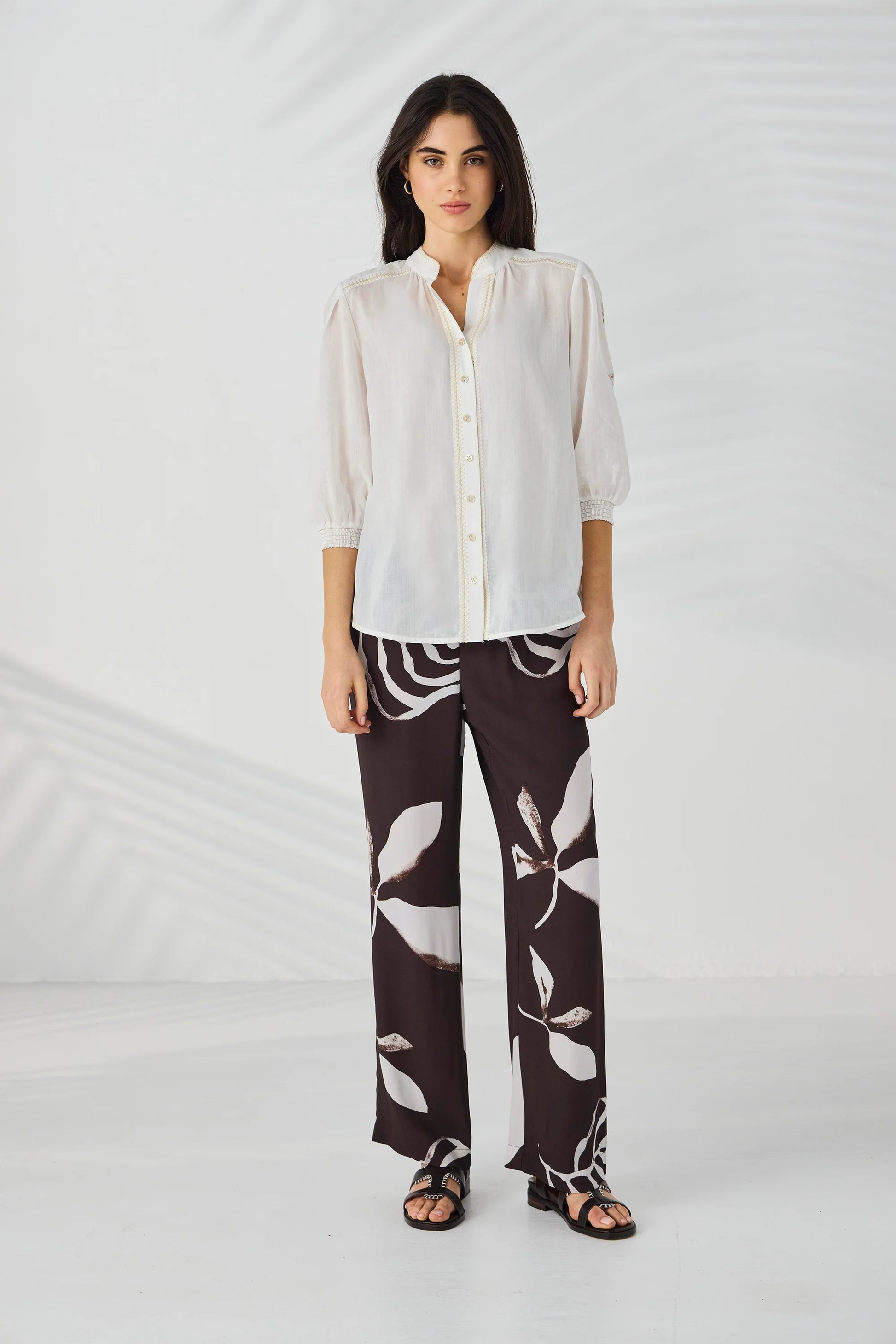 Lania Maple Pant in Maple Print styled with an ivory blouse for a relaxed daytime look