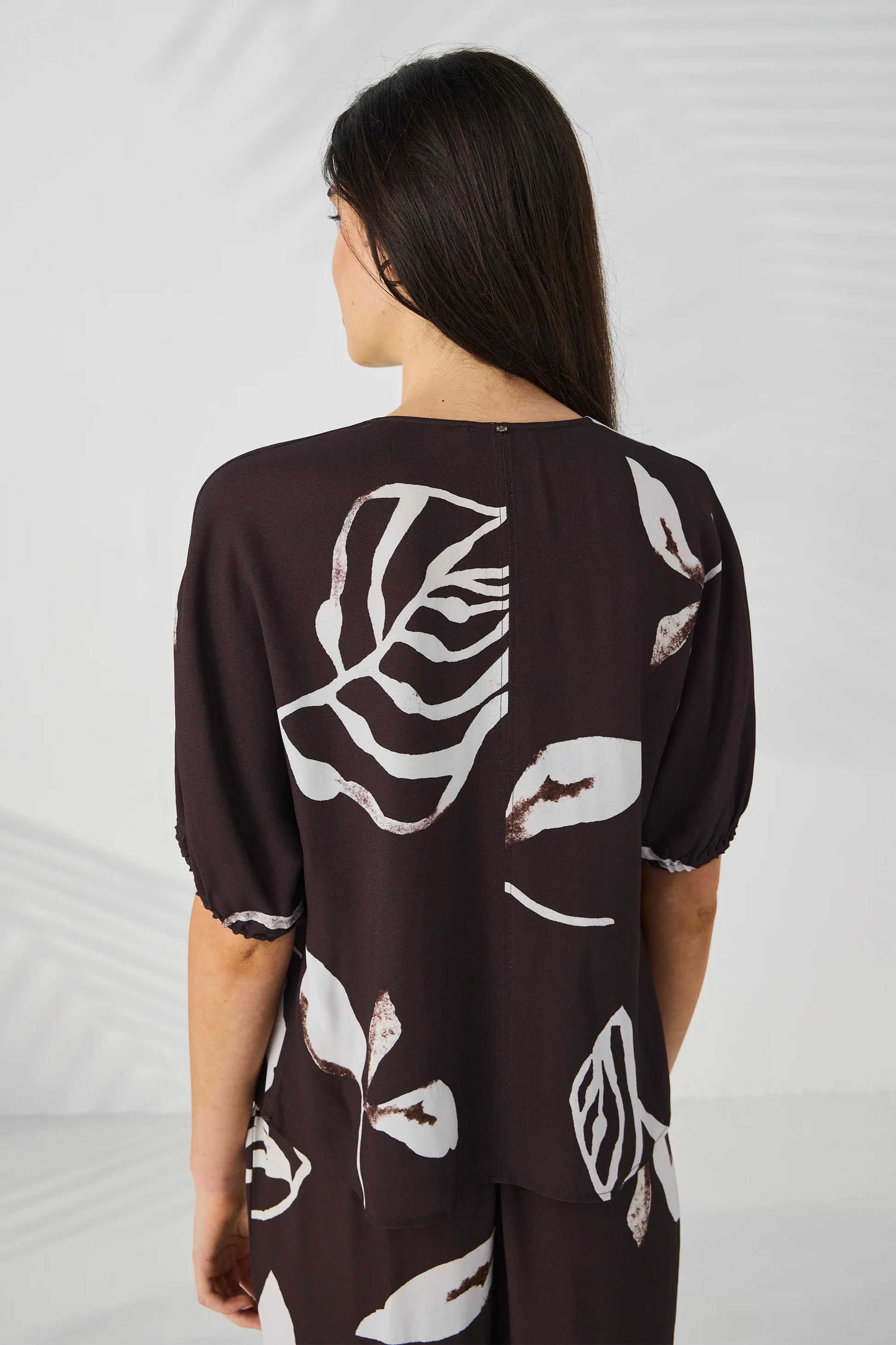 Back view of the Lania Maple Top in Maple Print showing the centre back seam