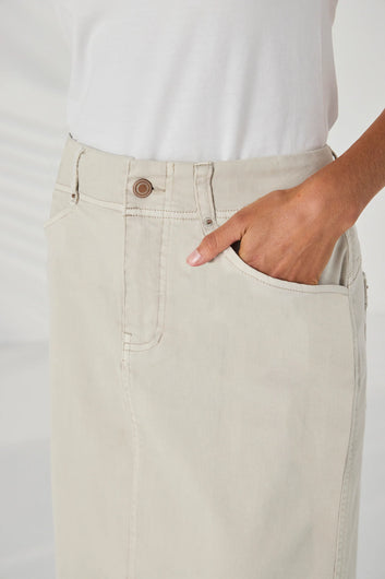 Detail of the front pocket and waistband on the Lania Ryder Skirt in Almond