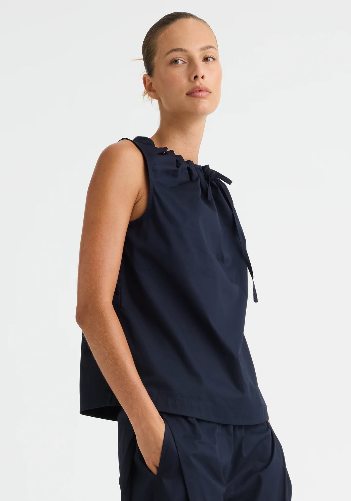 Morrison Maddison Tie Top in Navy, worn - three-quarter view