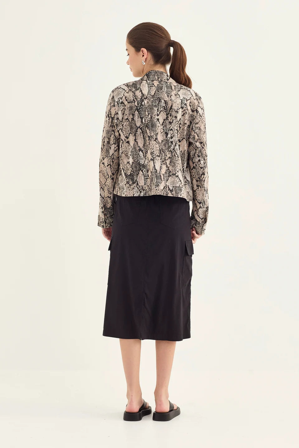Verge Acrobat Porter Skirt in Black, worn - back