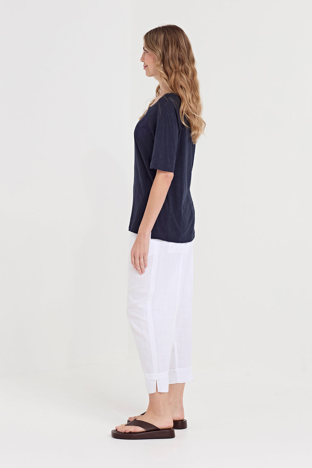 Verge Bounty Pant in White, worn - side