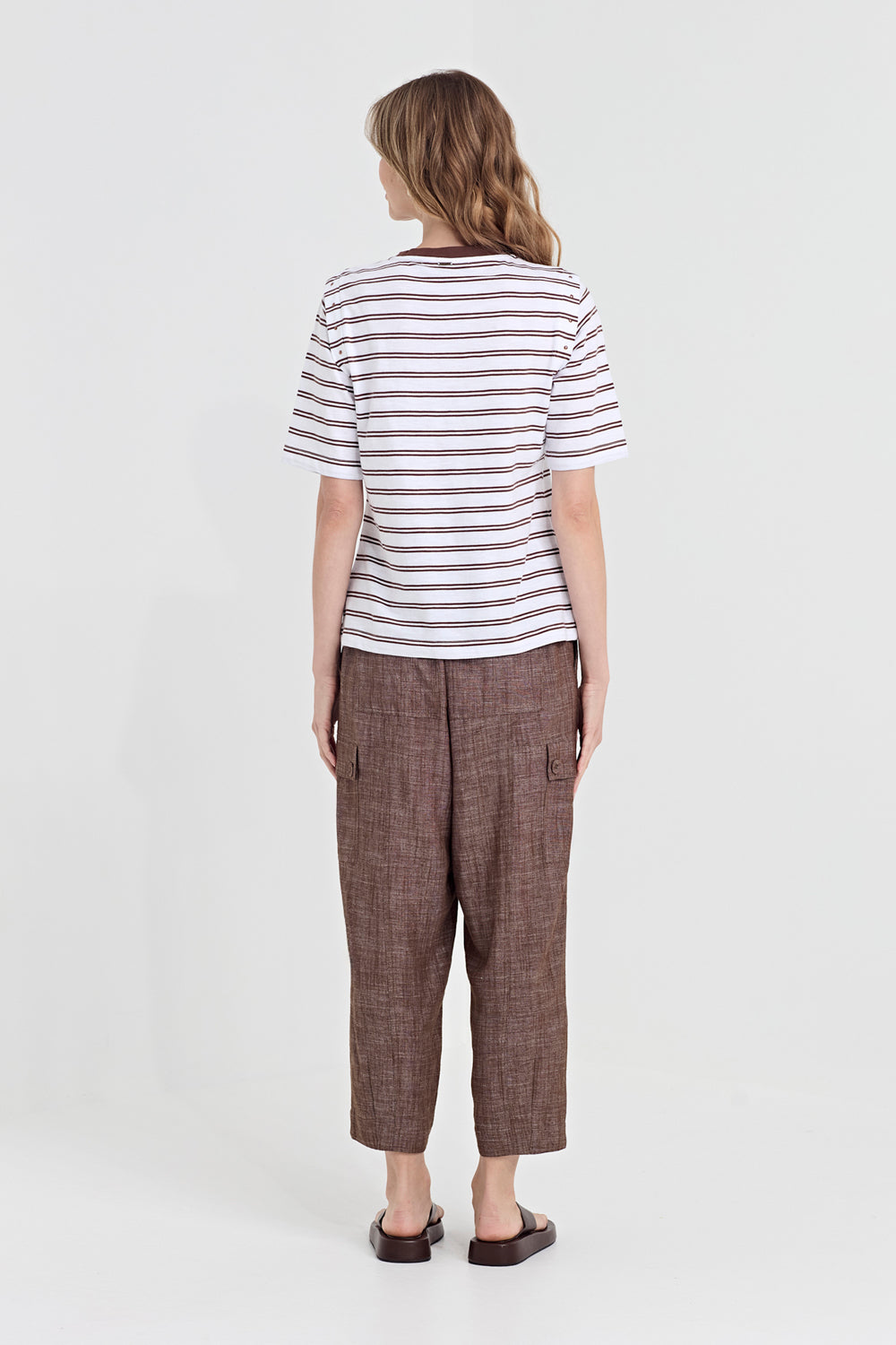Verge Faithful Pant in Cocoa, worn - back