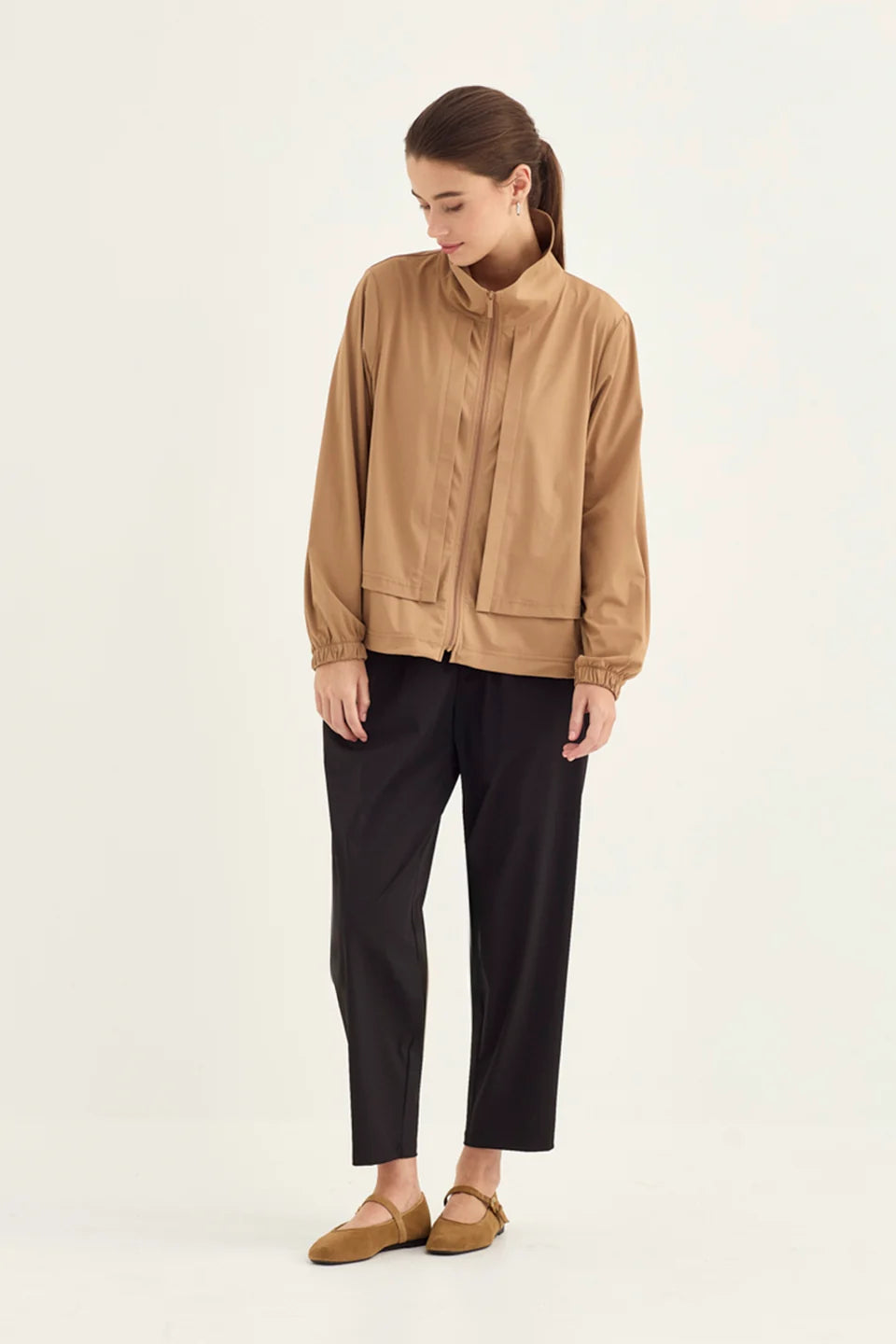 Verge Motion Jacket in Caramel, worn - front